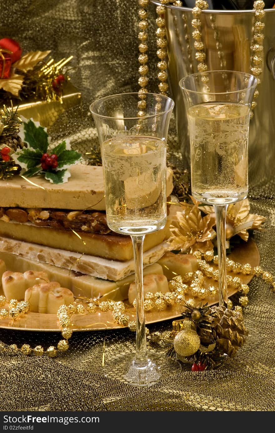 Typical Spanish Christmas nougat in a golden plate