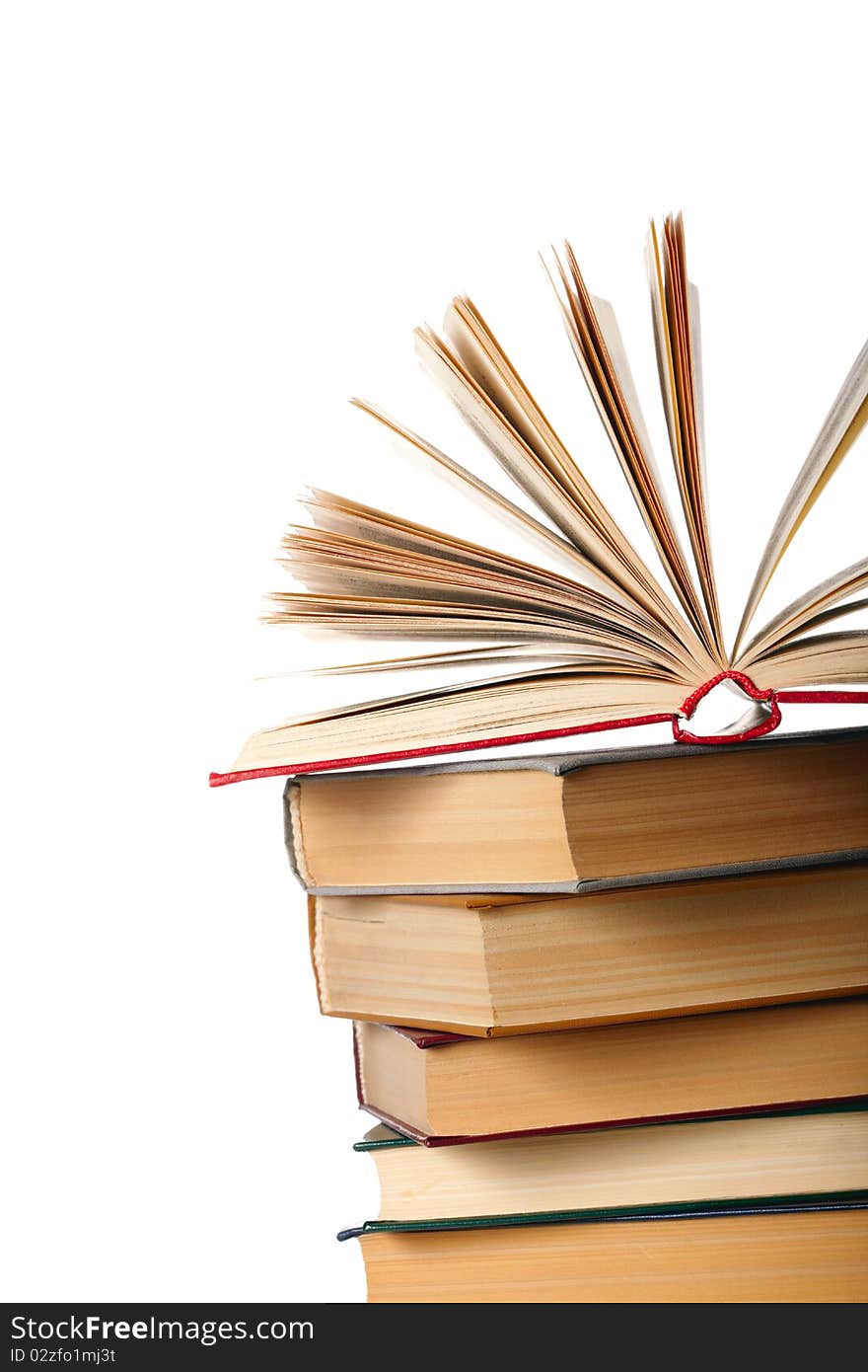 Pile of books on white background