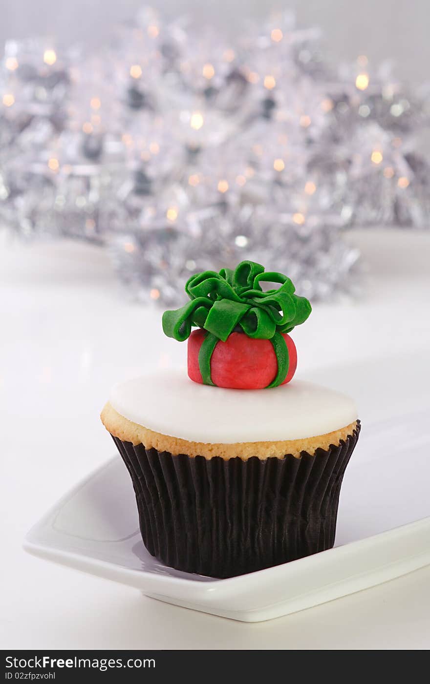 Perfect dessert for xmas decorated with wrapped gift made with edible fondant icing. Perfect dessert for xmas decorated with wrapped gift made with edible fondant icing