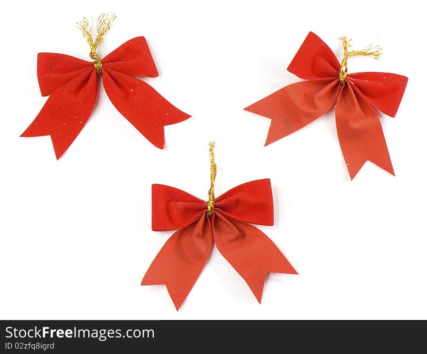 Three red ribbons isolated on white background