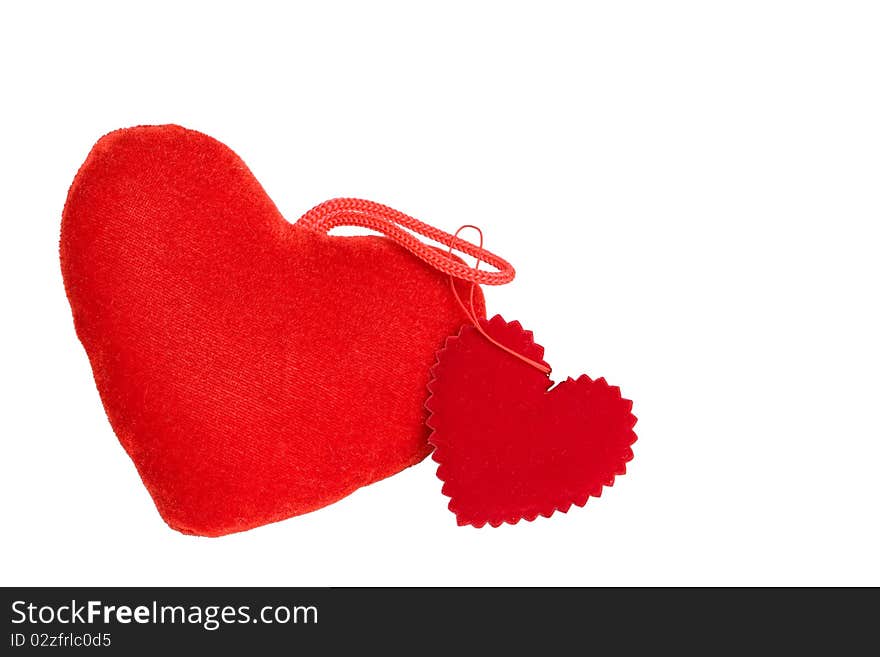 Two red soft hearts on a white background. Two red soft hearts on a white background