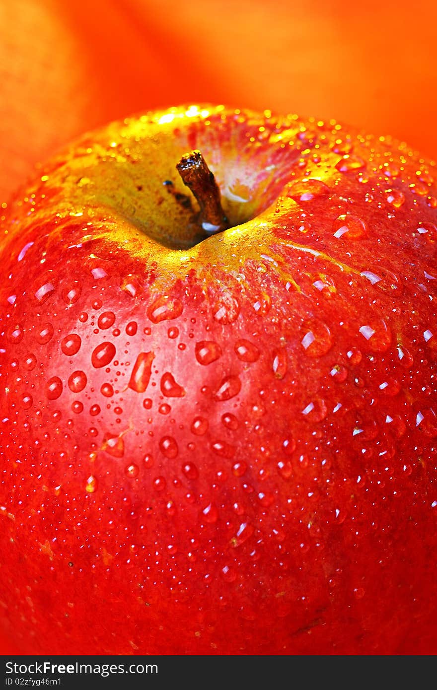 Fresh apple with water drops