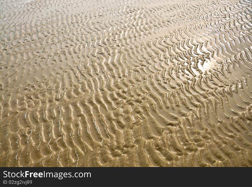 Reflex of sun in the sand pattern