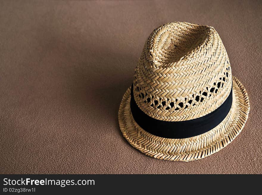 Beach Hat on brown background