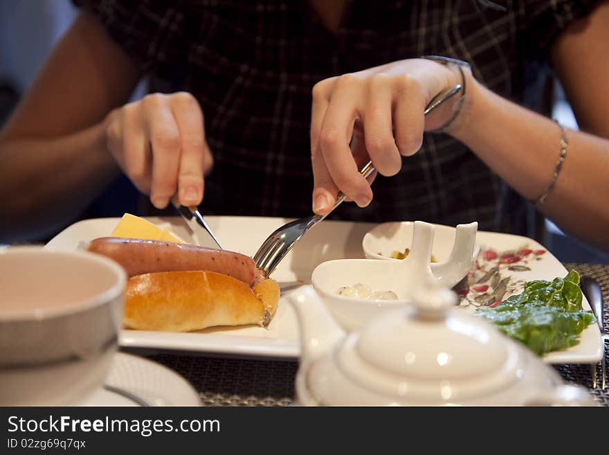 A Woman Eats Gorgous England Style Meal