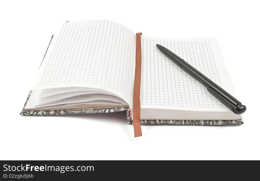 Diary with a pen on a white background