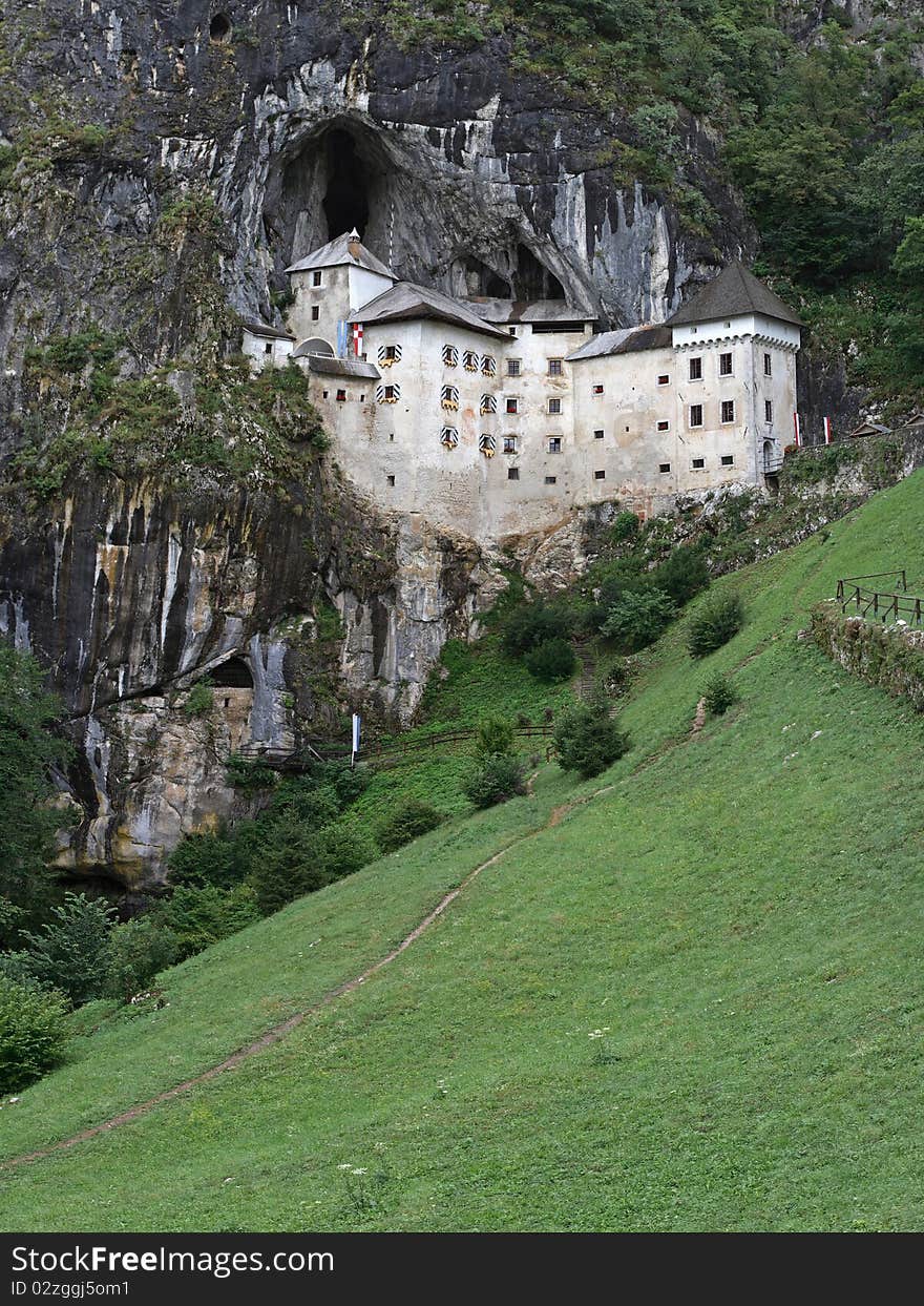 Predjama castle built within the cave mouth in southwestern Slovenia. Predjama castle built within the cave mouth in southwestern Slovenia.