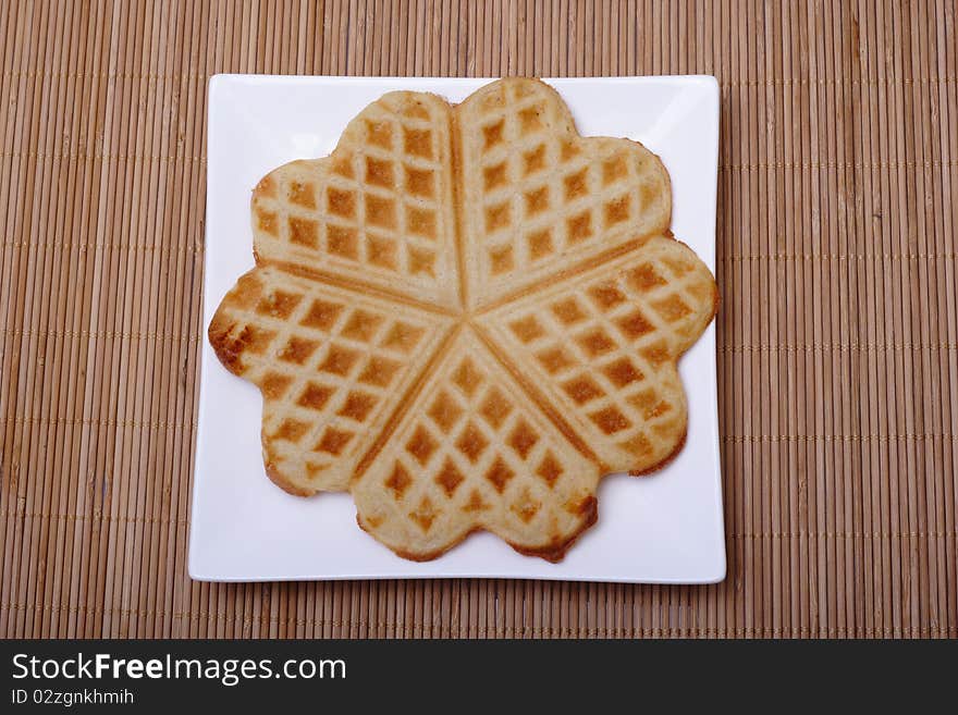 A Cake on square plate. A Cake on square plate