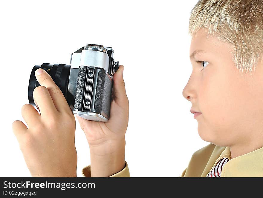 Professional photographer isolated on white. Portrait of young teenager