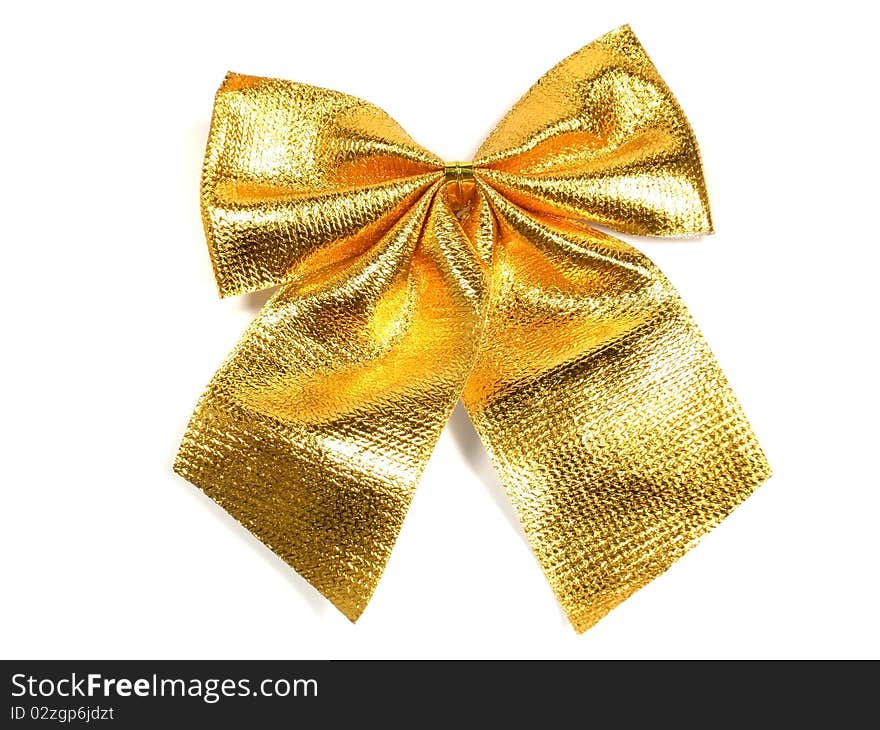 Gold bow on the white isolate background