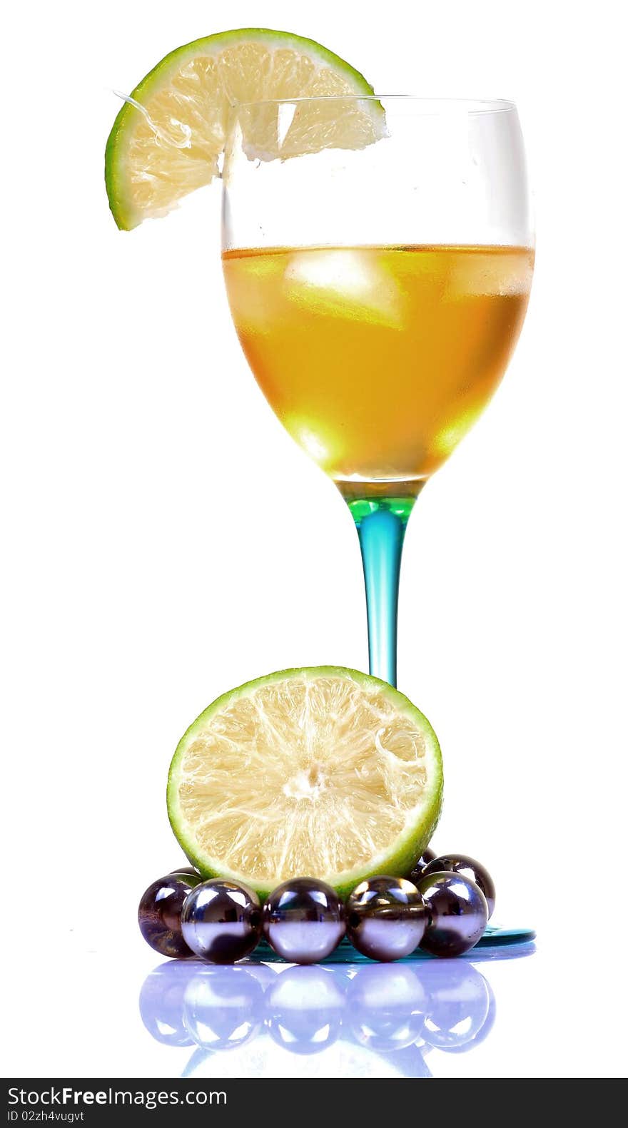 Apple wine glass with lemon isolated on white background. Apple wine glass with lemon isolated on white background.