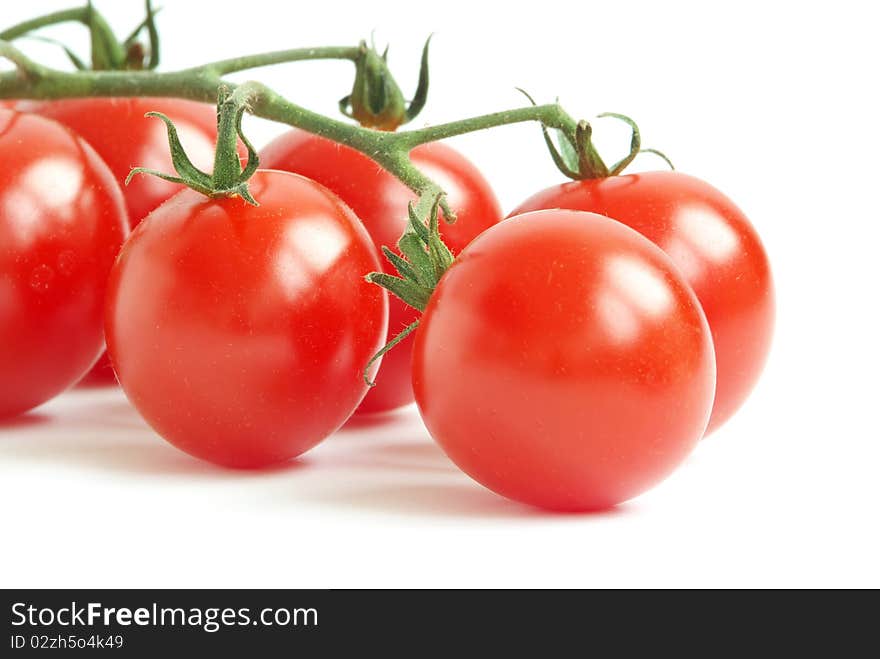 Bunch of fresh cherry tomato on white background