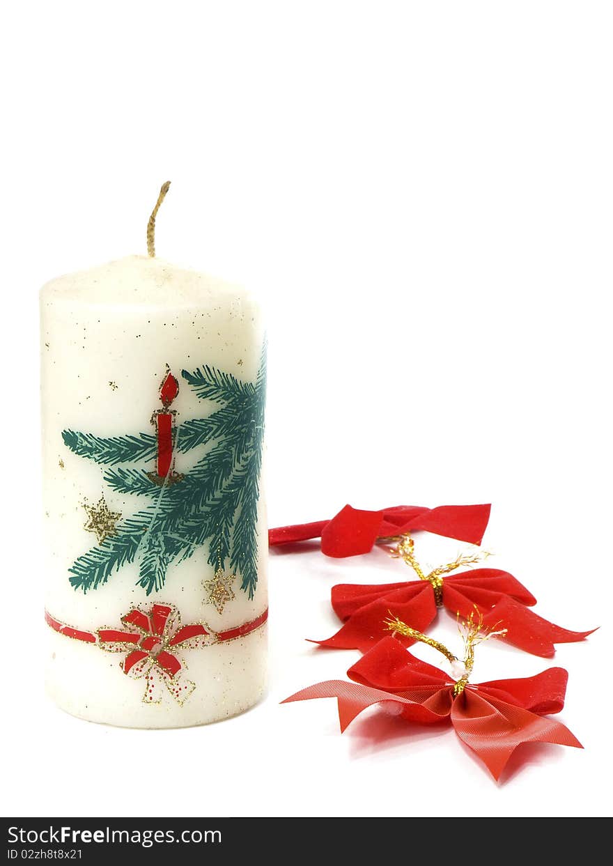 Christmas candle and ribbon isolated