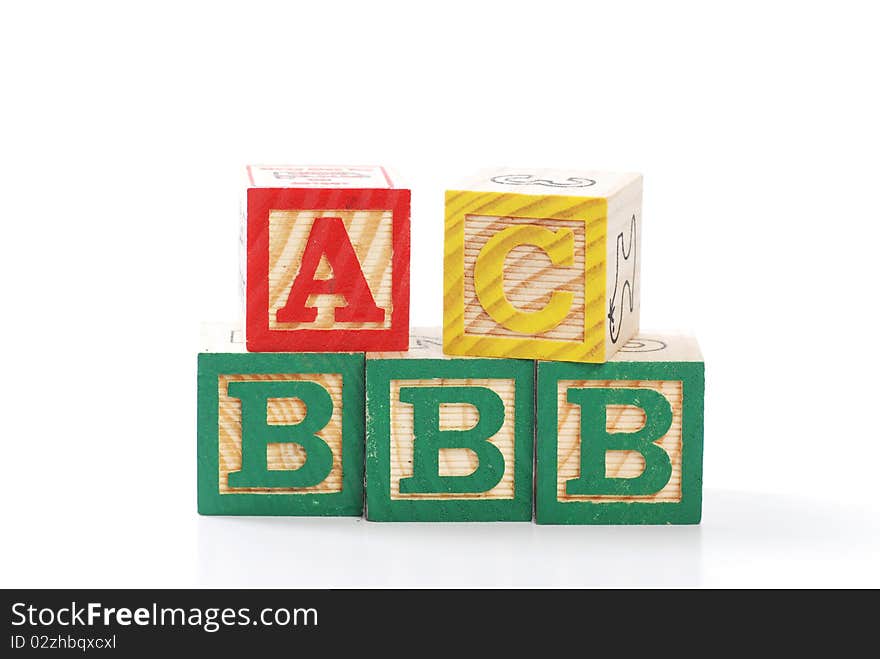 Children learning letter blocks isolated on white. Children learning letter blocks isolated on white