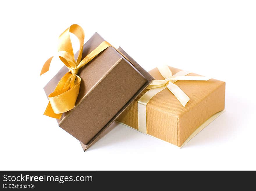 Christmas gift-boxes on white background, with ribbons. Christmas gift-boxes on white background, with ribbons