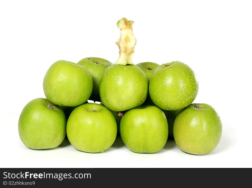 Several green apples on white background