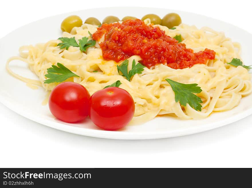 Pasta with cheese and sauce of peppers, tomatoes and garlic isolated on white