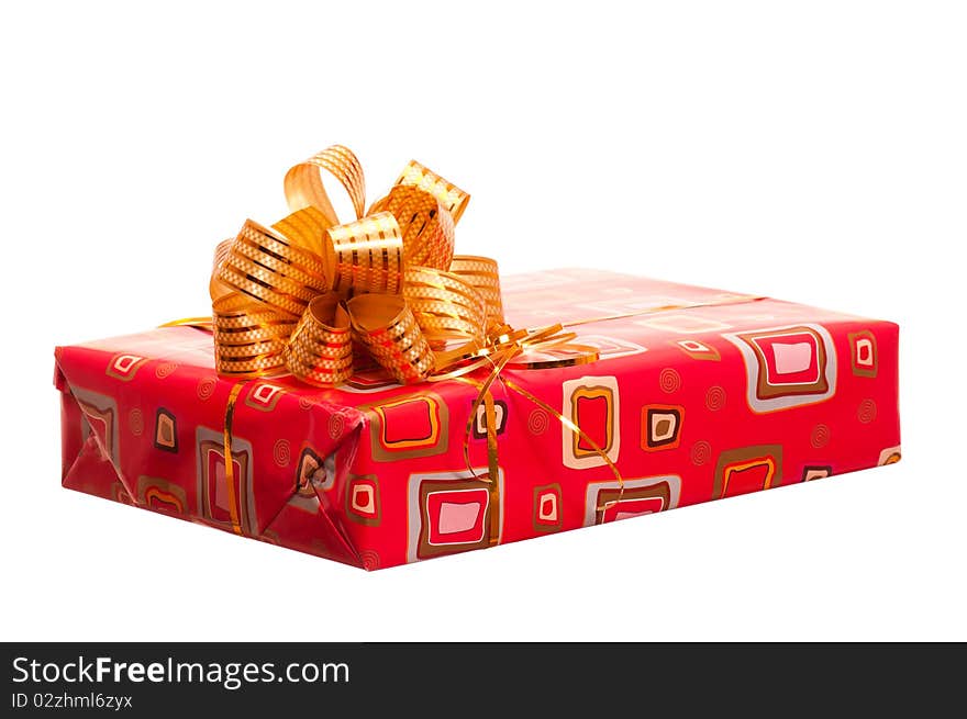 Red gift box with ribbon and bow on white background