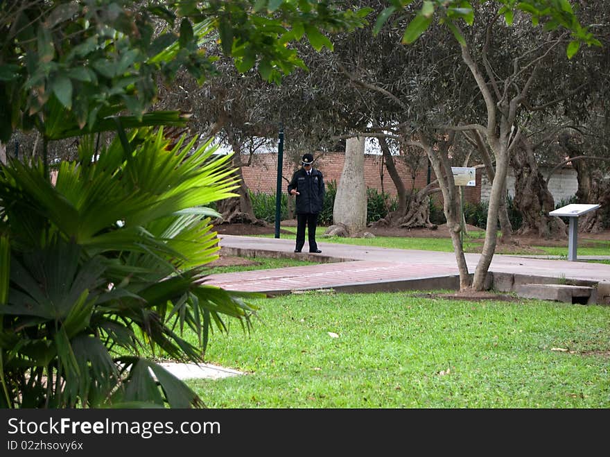 A guard in a park. A guard in a park