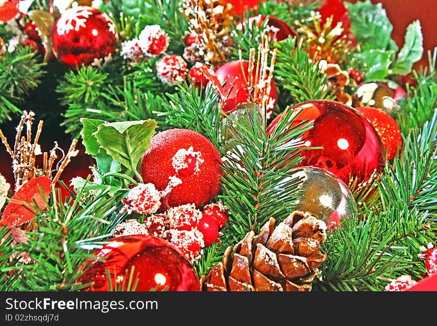 Close-up of a Christmas wreath with colorful decorations