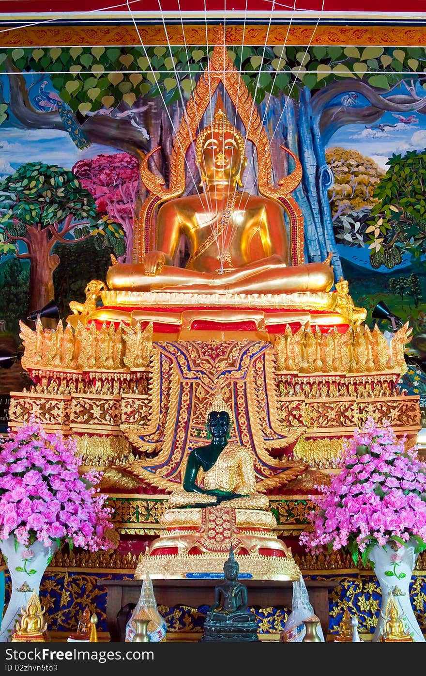 Buddha in church at Wat Kaotulian temple, Thailand.