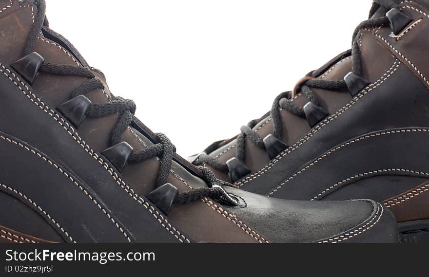 Series. Black leather shoes on a white background