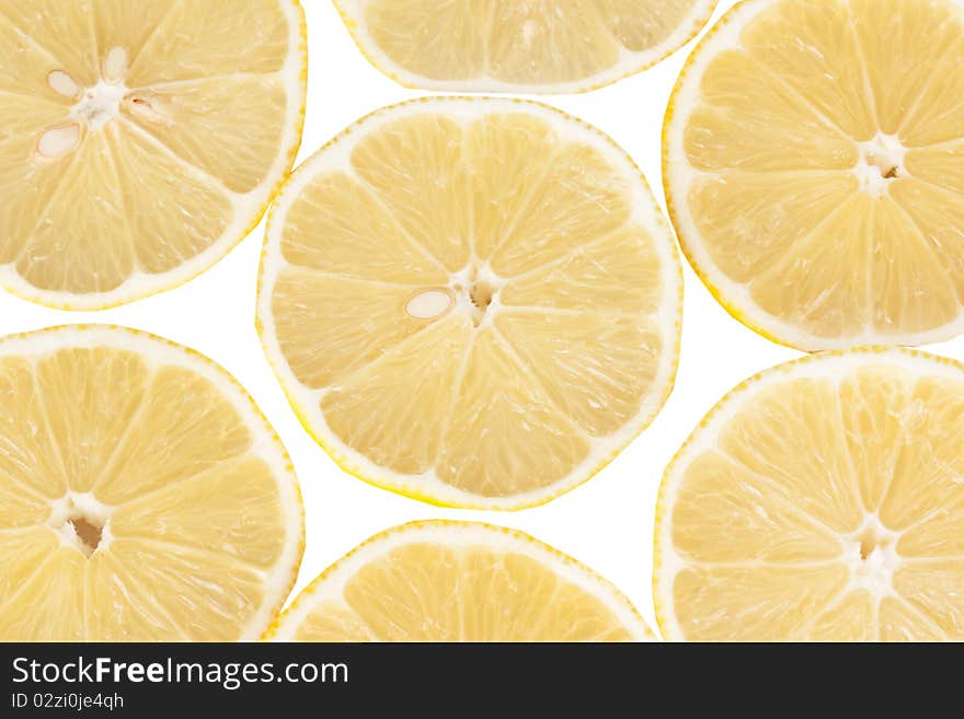 Sliced lemons isolated on white background