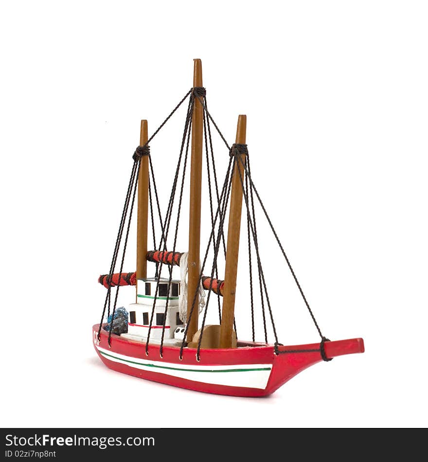 Small model ship isolated on white background