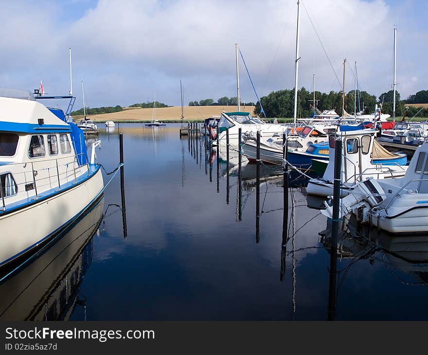 Yachts and sail boats in a marina