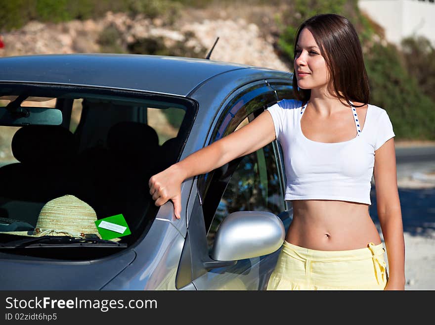 A Woman Is Near The Car