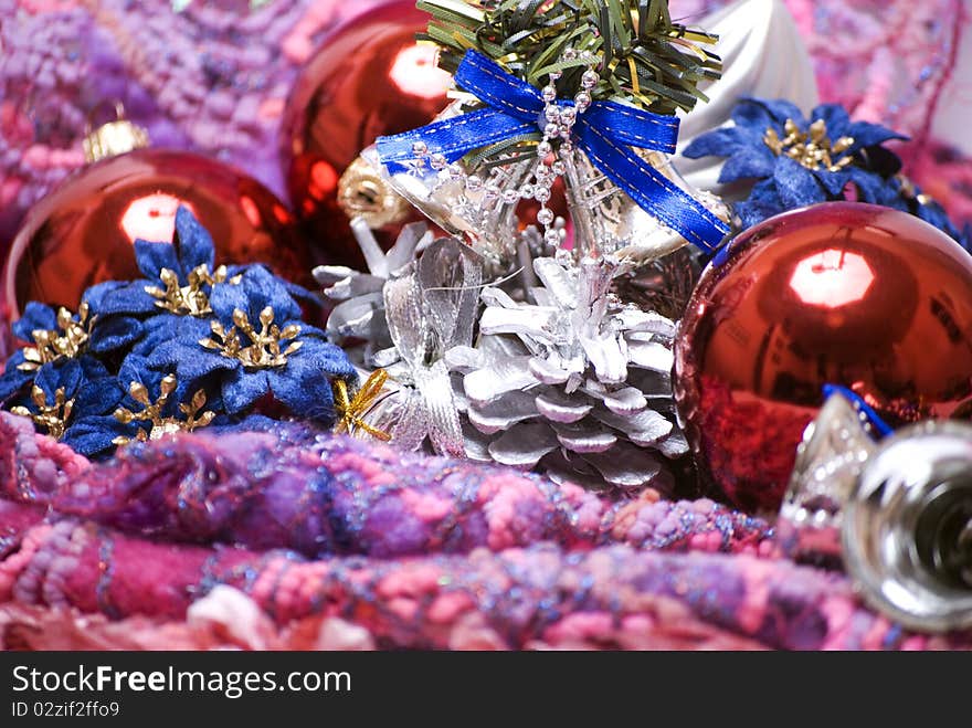 Different Christmas decorations on the soft colorful material. Different Christmas decorations on the soft colorful material