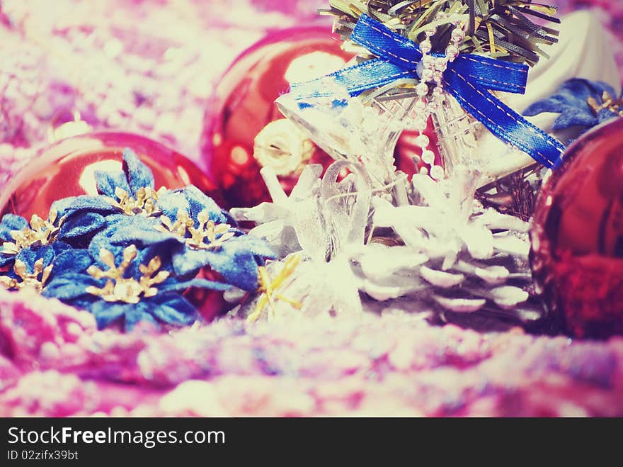 Different Christmas decorations on the soft colorful material. Different Christmas decorations on the soft colorful material