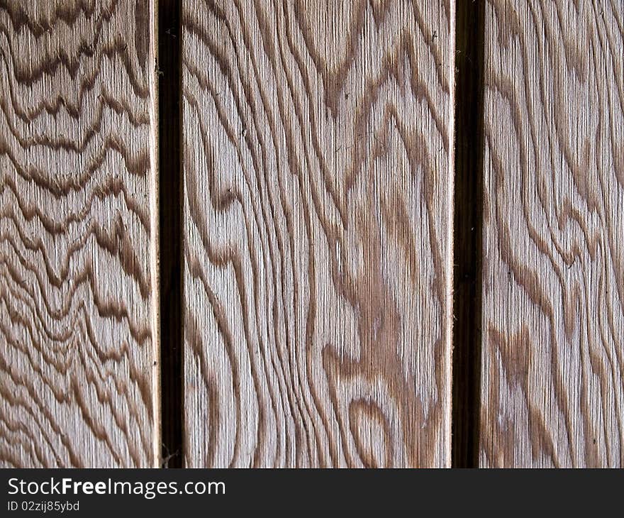 Old textured wood pattern surface on a wall background. Old textured wood pattern surface on a wall background