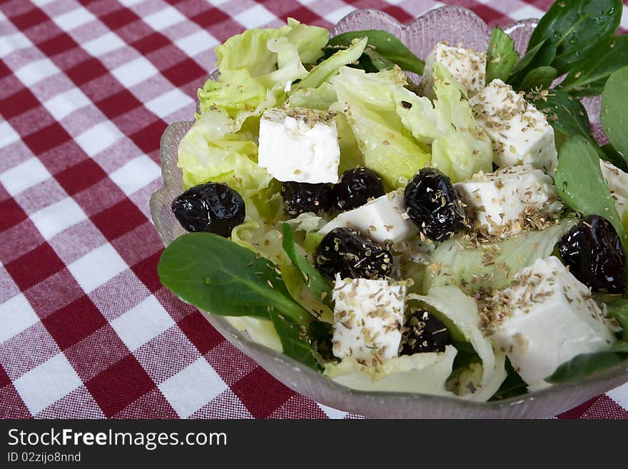 Greek salad, mediterranean cuisine with feta cheese and olives