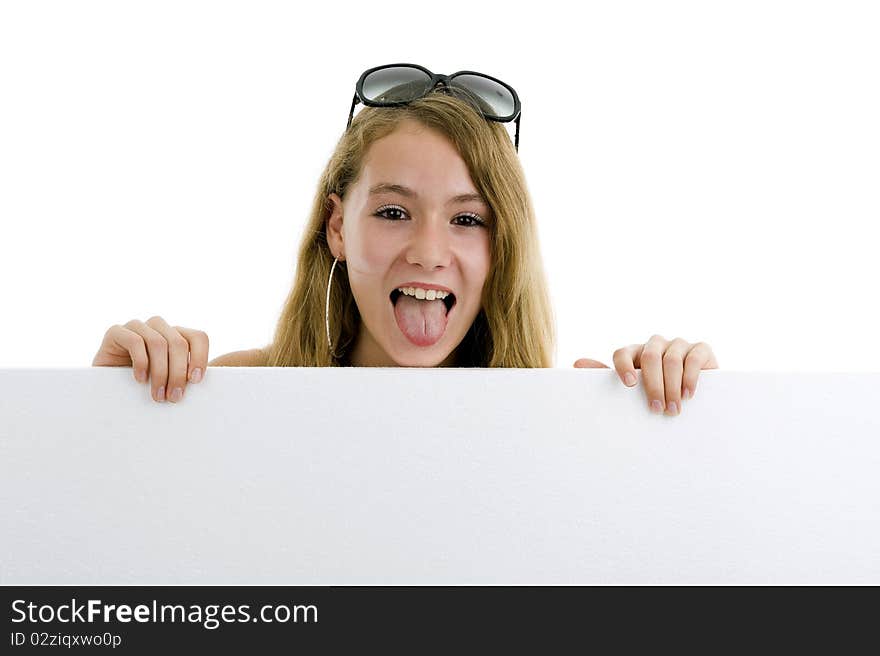 Girl sticking her tongue out with blank display board, isolated on white background. Girl sticking her tongue out with blank display board, isolated on white background