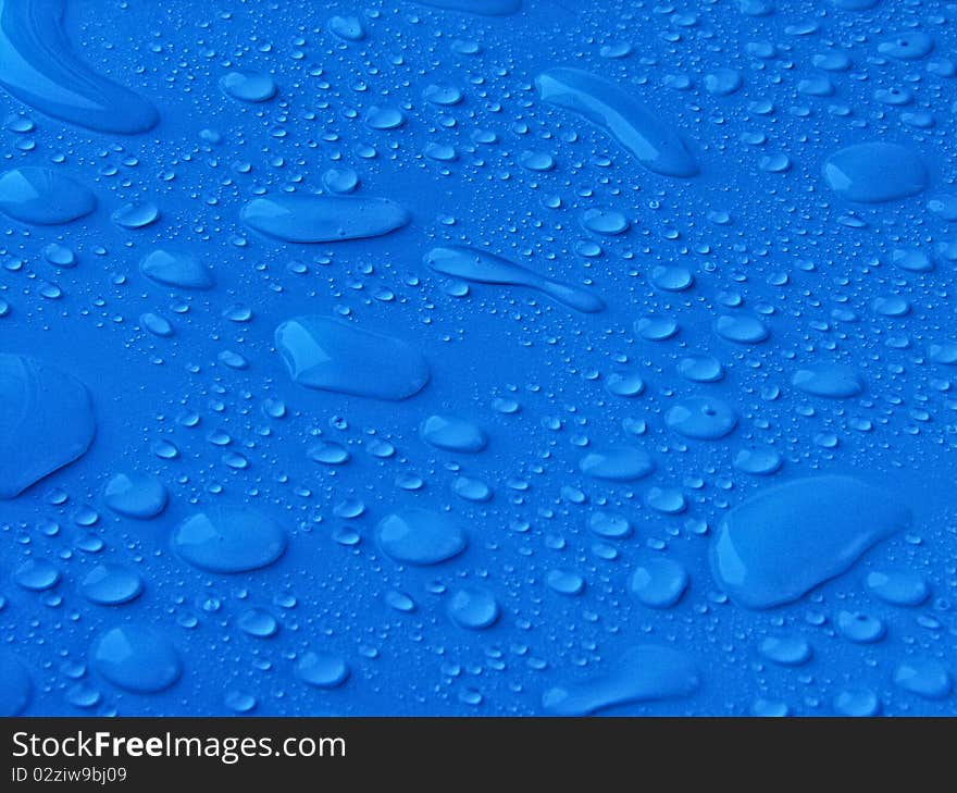 Abstract blue water drops background