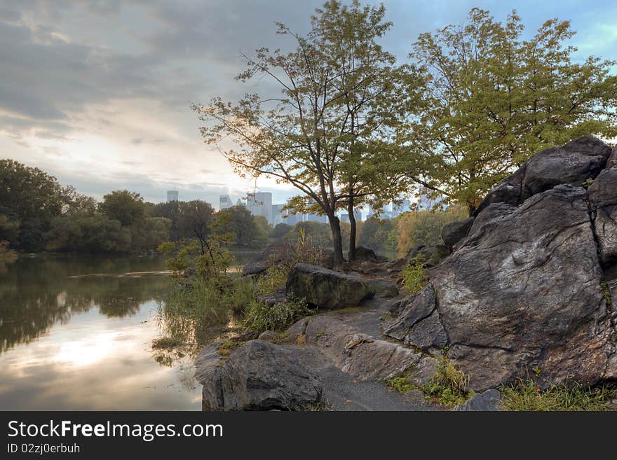 Early autumn in Central Park by the lake. Early autumn in Central Park by the lake