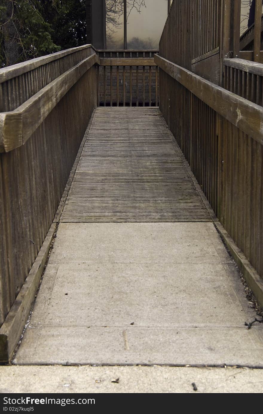 A building with a handicap ramp to the entrance. A building with a handicap ramp to the entrance.