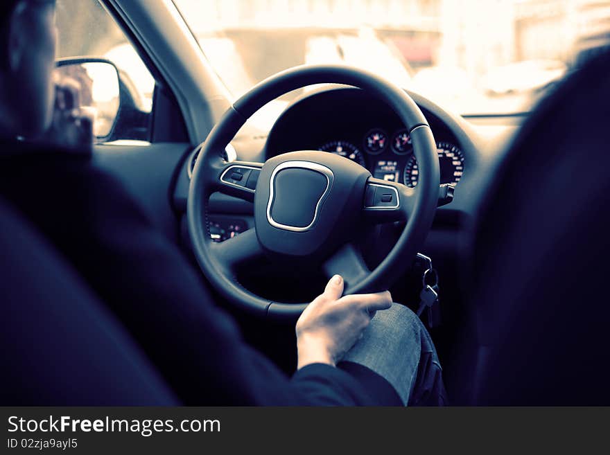 Young woman driving a car. Young woman driving a car