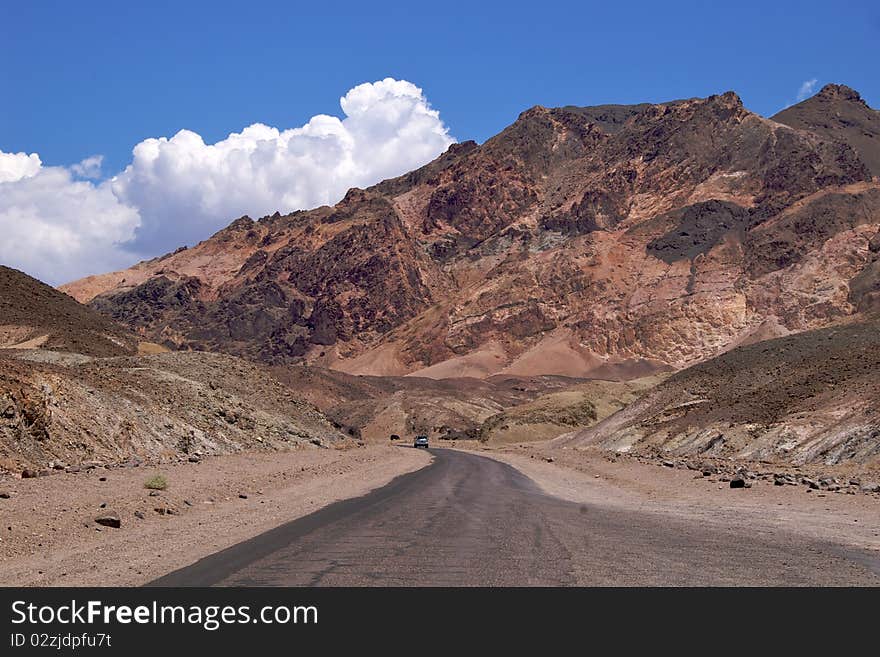 Car on Artists Drive, Death Valley National Park. Car on Artists Drive, Death Valley National Park