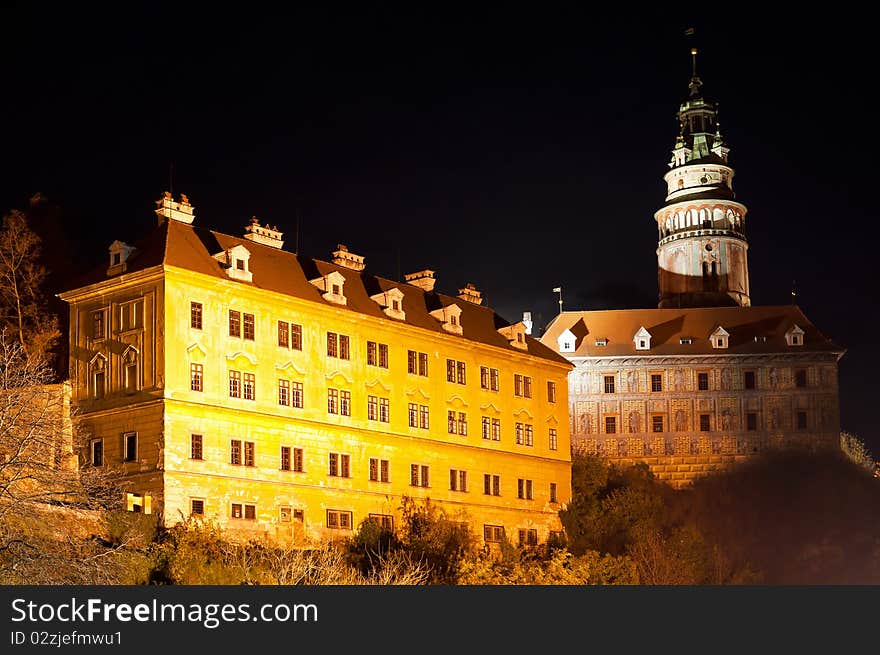 View at a castle in Cesky Krumlov during the nighttime.