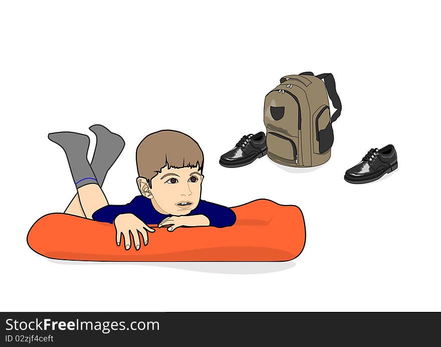 Young boy relaxing on a cushion after school with school bag and shoes