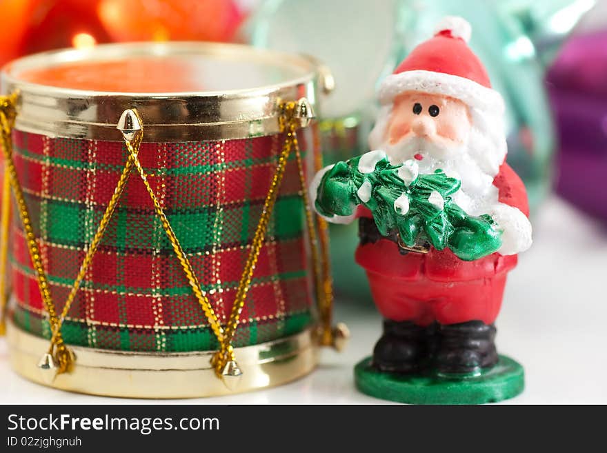 Christmas Santa Claus ornament in front of other decorations