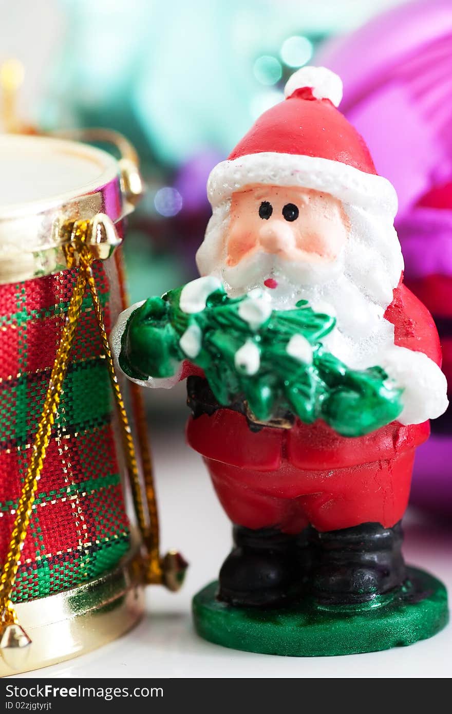 Christmas Santa Claus ornament in front of other decorations