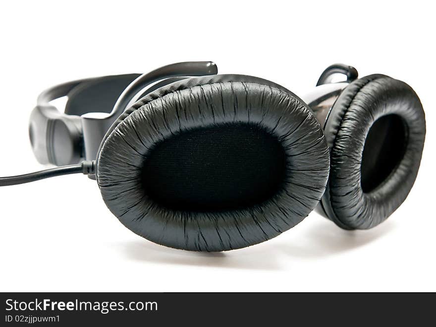 Black headphones isolated on white background