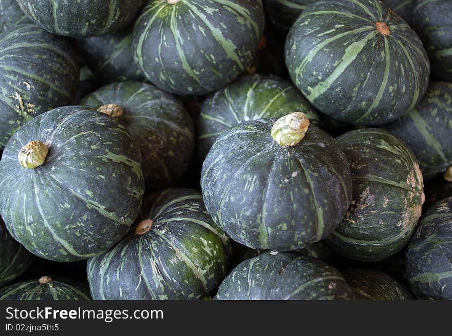 A pile of green pumpkin.