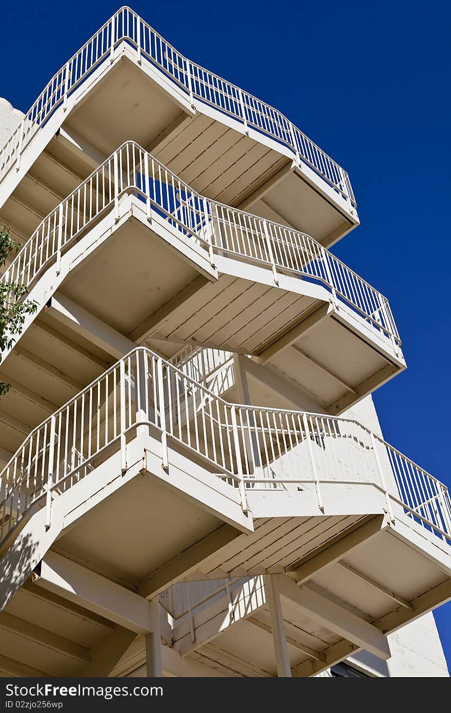 Metal fire escape on the side of a building. Metal fire escape on the side of a building