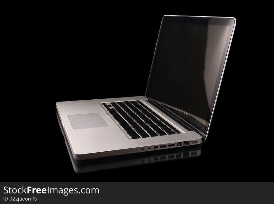 Aluminium laptop with desktop on black background. Aluminium laptop with desktop on black background