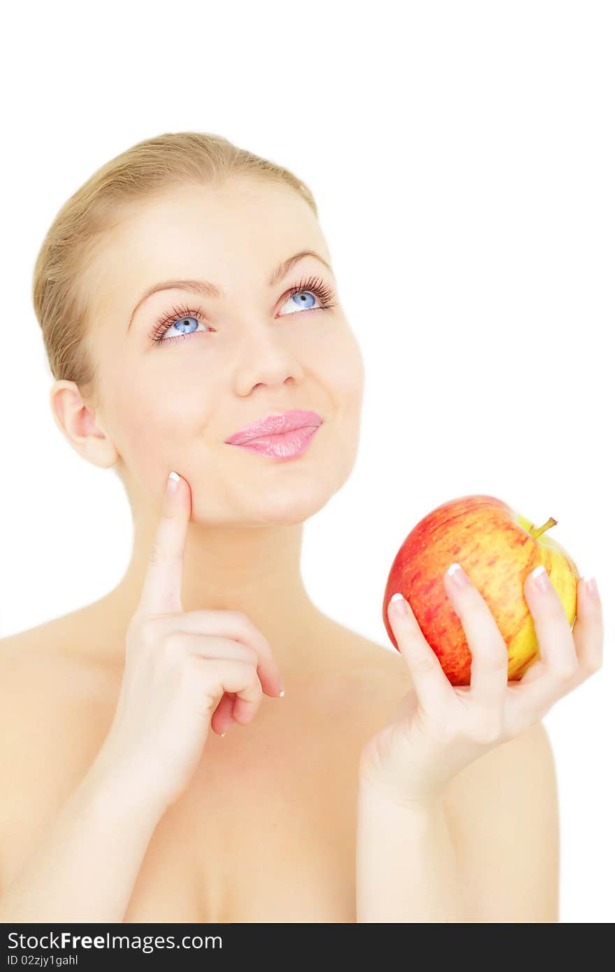 Beautiful girl holding a red apple isolated on a white background