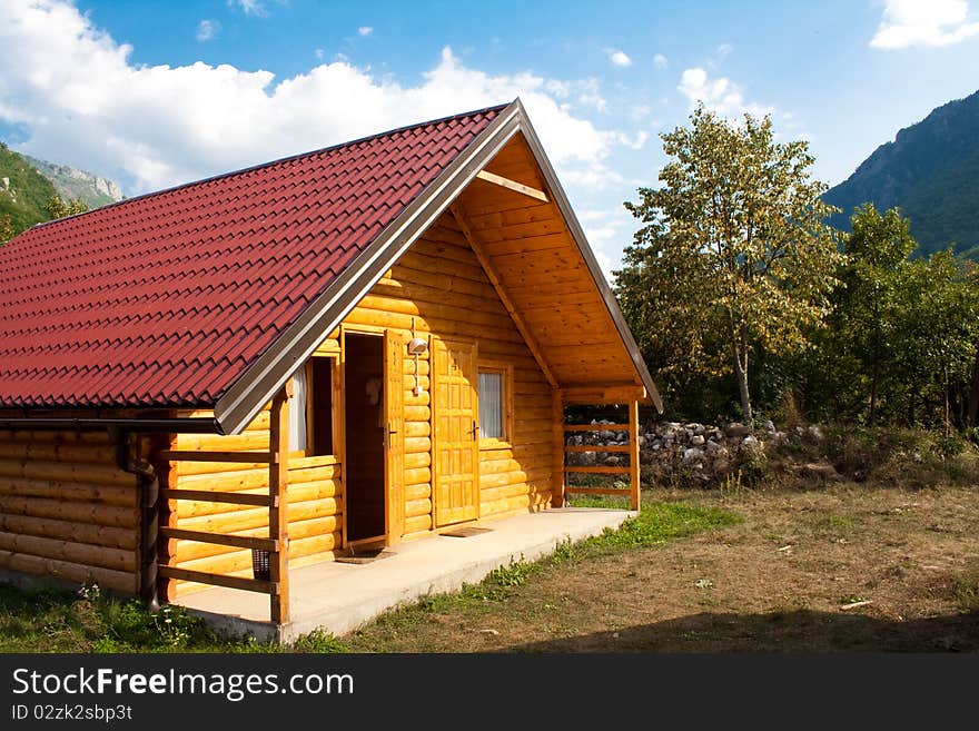 Wooden house in the forest behind the river, Montenegro, Crna Gora, Scepan Polje. Wooden house in the forest behind the river, Montenegro, Crna Gora, Scepan Polje